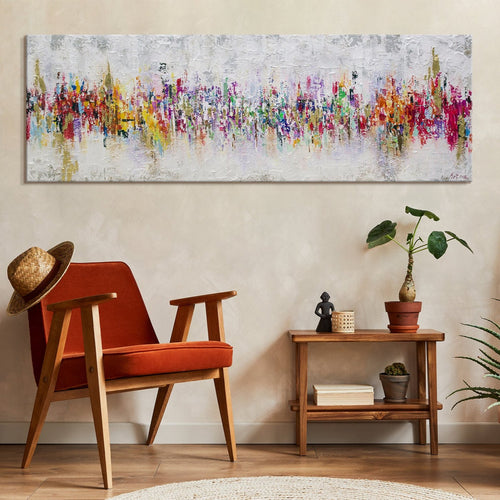 Wohnraum mit abstraktem buntem Leinwandbild