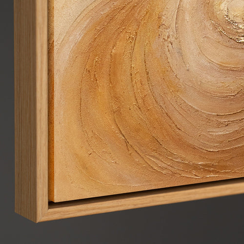 Abstraktes Wandbild auf Leinwand in warmen Goldtönen mit massivem Rahmen