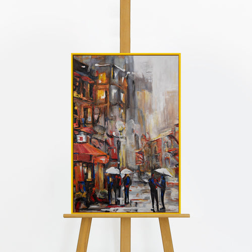 Handgemaltes Acrylbild „Städtische Atmosphäre" auf Staffelei – expressives Stadtbild, gelber Rahmen