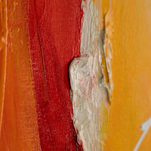 Close-up of vibrant textured abstract painting, featuring rich red and yellow colors for dynamic wall art