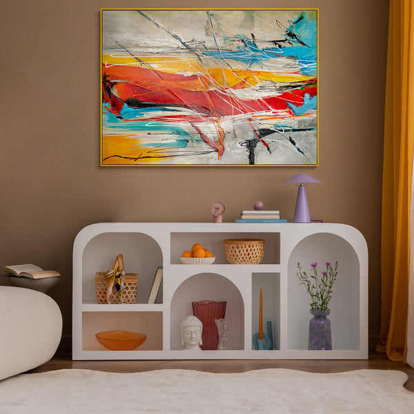 Elegant modern living room decor featuring a vibrant abstract painting on the wall, with a stylishly curated shelf displaying assorted decorative items enhancing contemporary home aesthetics