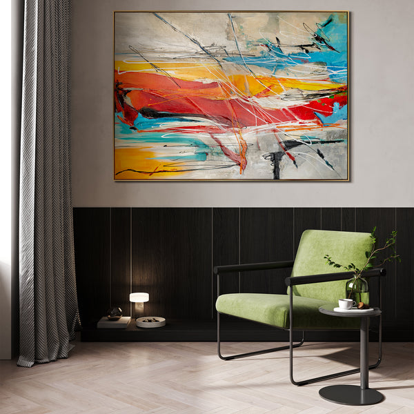 Contemporary room design featuring vibrant abstract canvas art and a stylish green armchair