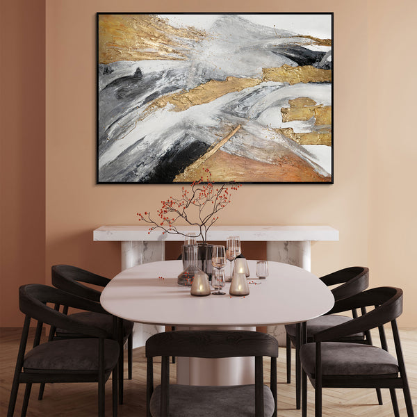 Elegant abstract painting in gold and grey tones, framed, displayed over a modern dining area, perfect as wall art for living room or dining room decor