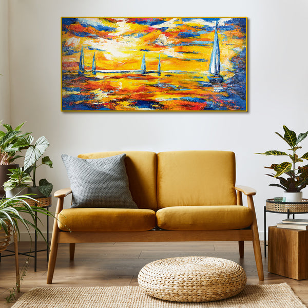 Large abstract art painting in living room featuring golden and blue hues, ideal for modern wall decor and enhancing cozy home atmosphere