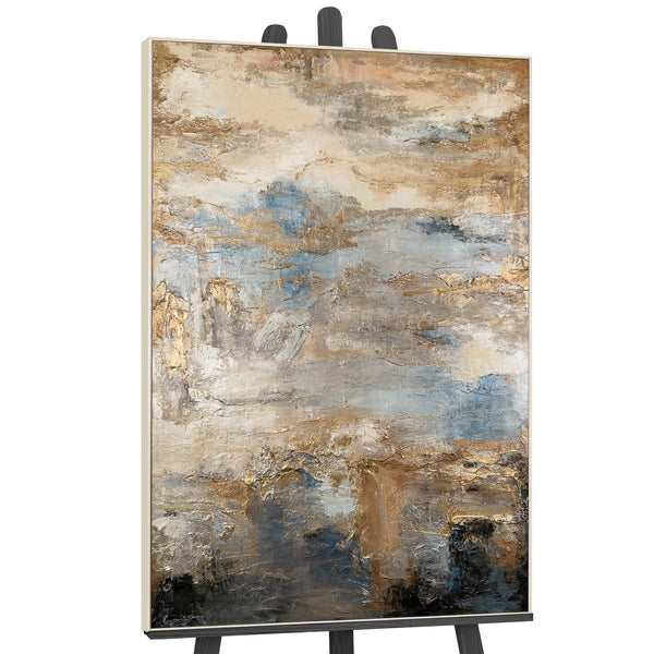 Abstract painting with gold and blue accents on display easel for artistic presentation