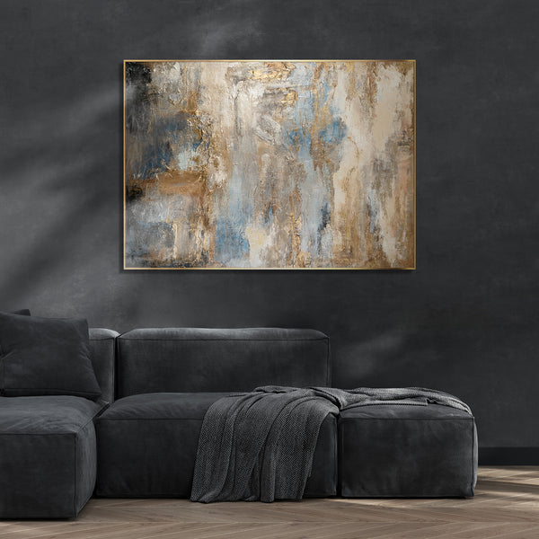 Abstract art painting in living room with blue and gold tones, modern wall art