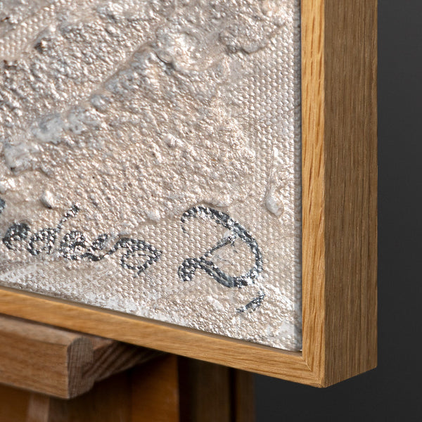Detail eines Leinwandbildes mit Holzrahmen