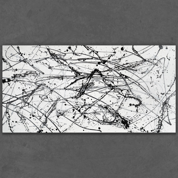 Hand-painted black and white drip art on rolled canvas